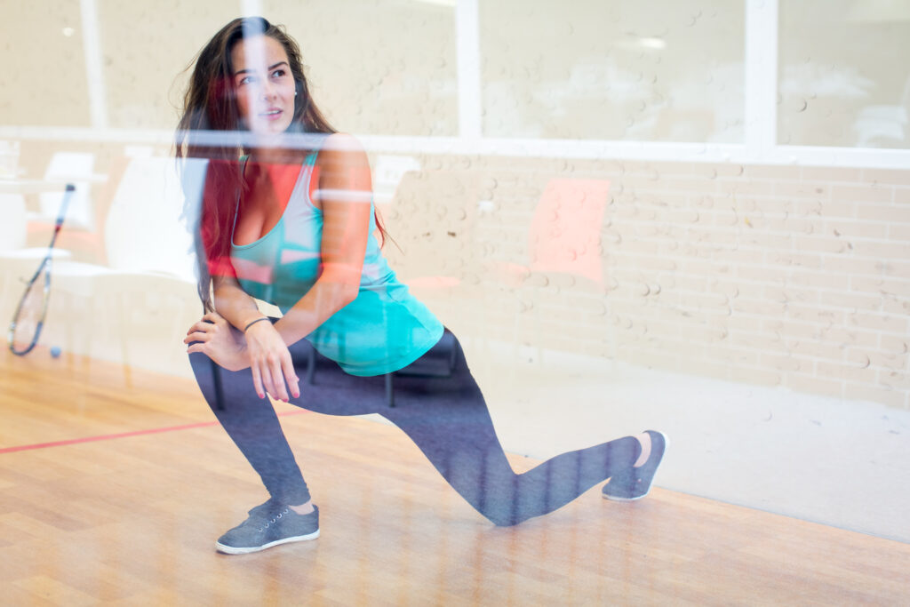 stretching before a squash game